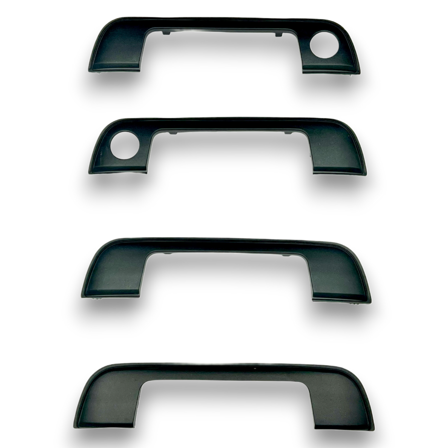 vier neue Türgriff Blenden für E36, E34 und E32 von vorne
