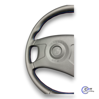 BMW M-Technik Sportlenkrad mit Airbag, neu bezogen in Schwarz mit M-Naht für Oldtimer-Modelle
