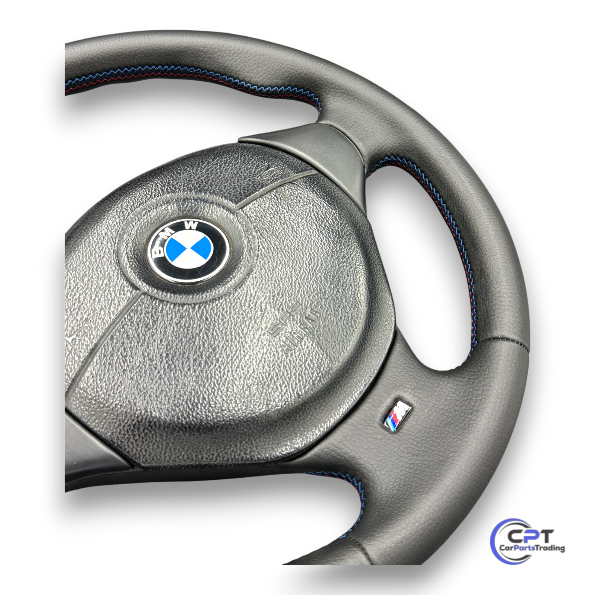 Original M-Lenkrad für BMW E36, E39, E34, E31 mit markanter M-Naht in Blau, Dunkelblau und Rot

